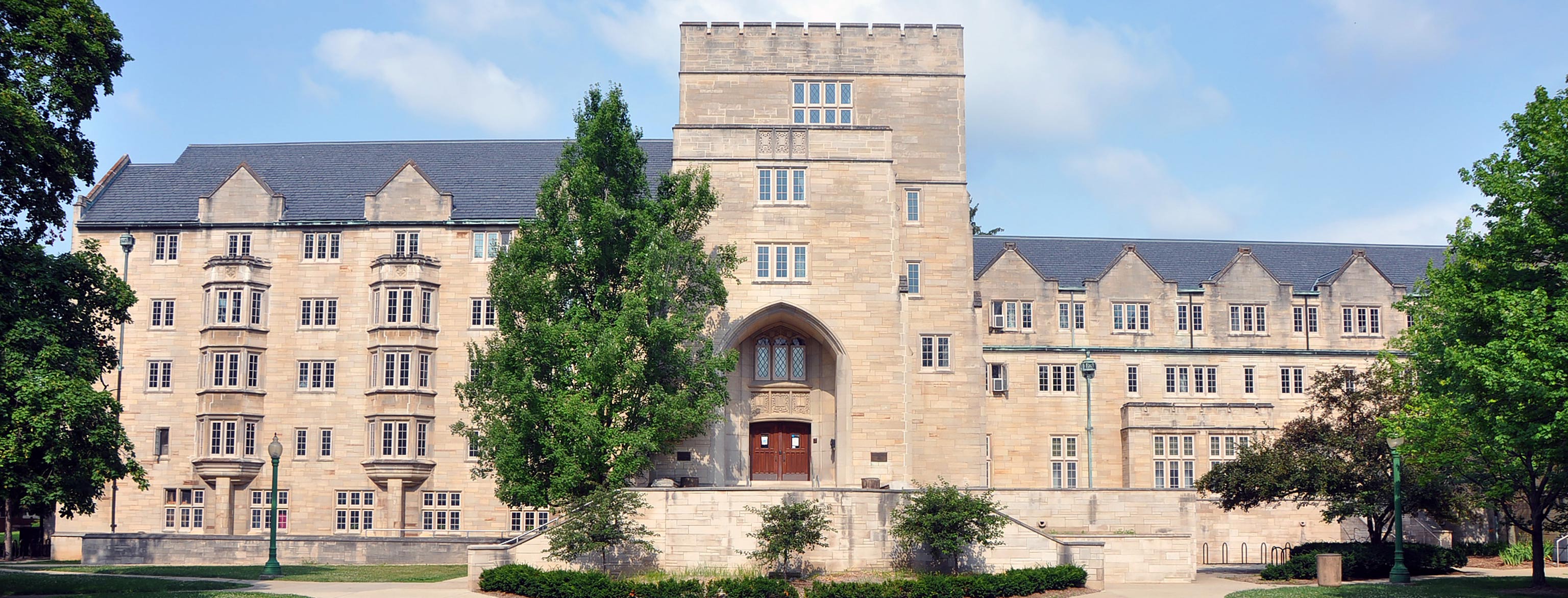 Exterior of the Collins Living-Learning Center, a large limestone dormitory 